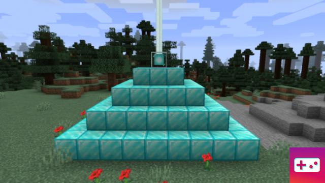 What is the range of a beacon in Minecraft?